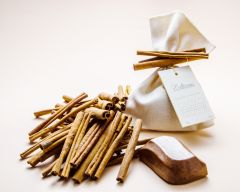 Cinnamon soap in a cloth bag decorated with Real Cinnamon Sticks